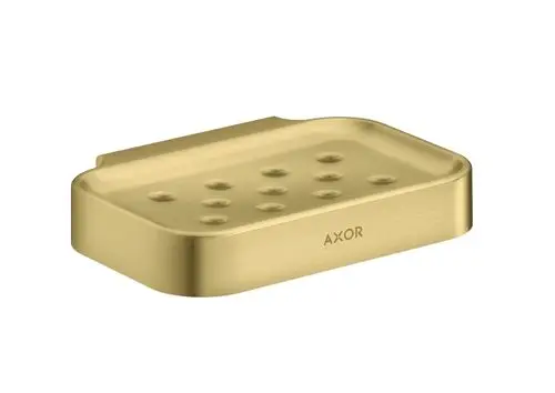 Flache Seifenschale in gebürstetem Messing mit mehreren Löchern zur Wasserableitung. Auf der Seite ist das Logo von AXOR zu sehen.